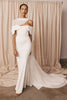 Woman in a wedding dress and sheer bridal cape