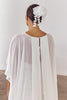 back of sheer georgette wedding shawl paired with floral headpiece
