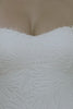 A detailed lace wedding dress